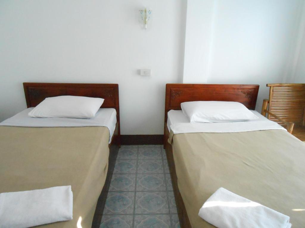 Ban Nongdouang Chanthasom Guesthouse חדר תמונה
